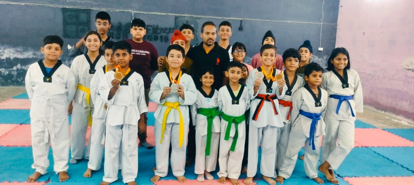 RR Taekwondo Academy students with their medals