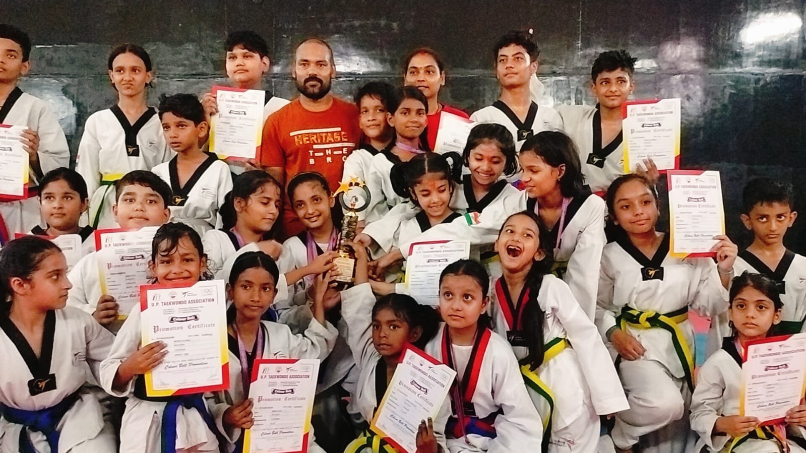 Students displaying their Taekwondo medals